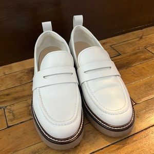 White leather loafers